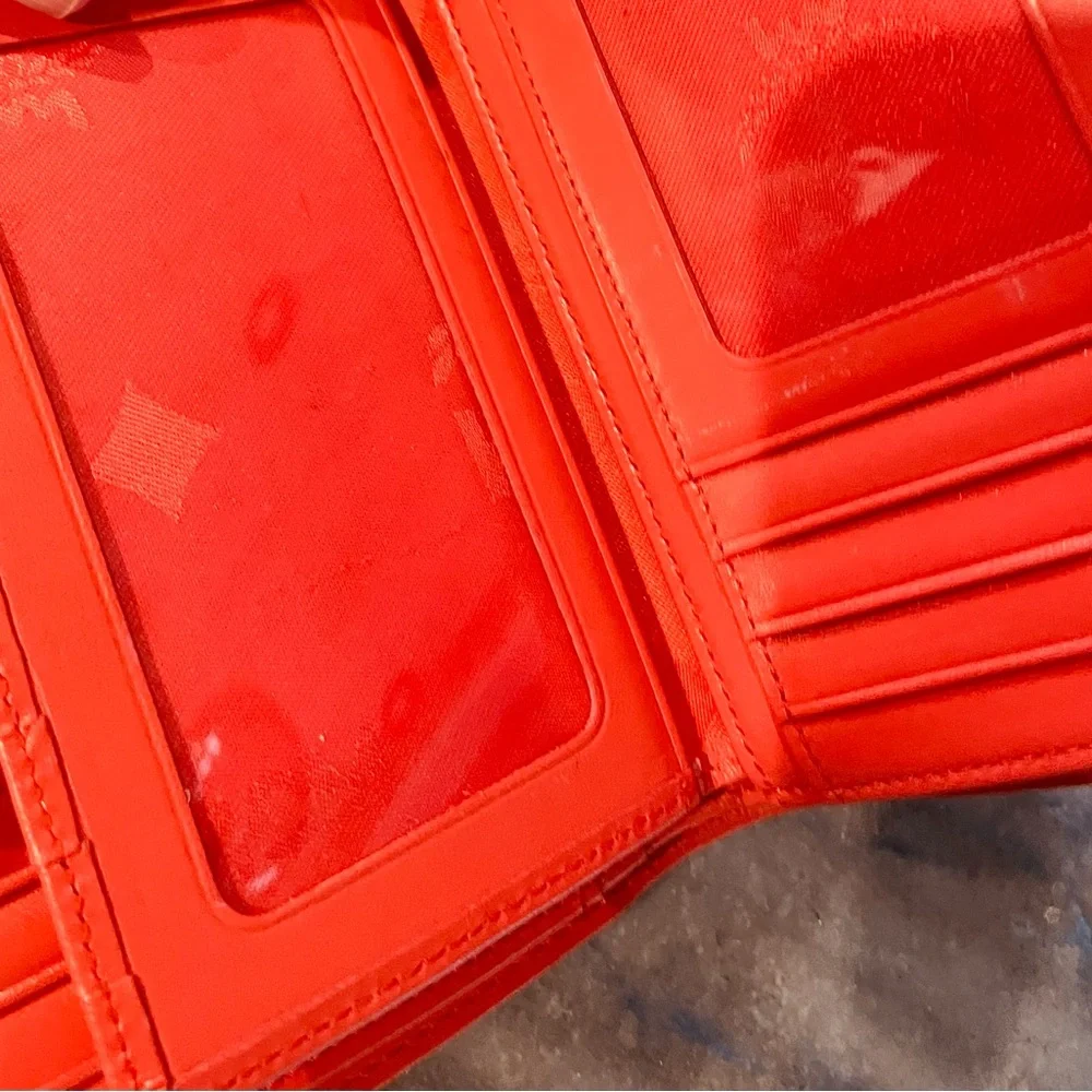MCM Embossed Leather Compact Wallet